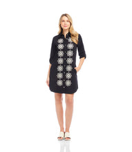 Load image into Gallery viewer, Elevate your wardrobe with the Roll Tab Embroidered Shirtdress by Karen Kane—a perfect blend of classic elegance and artisanal charm. Featuring delicate floral silk embroidery, a collared neckline, and adjustable roll-tab sleeves, this laid-back yet polished dress is designed for effortless style.
