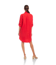 Load image into Gallery viewer, Stay cool and stylish with the Karen Kane Rio Roll Tab Linen Shirtdress in Cherry. Crafted from 100% linen, this breathable, lightweight dress is perfect for sunny days and easy layering. Featuring a crisp collar, front button closure with delicate shell buttons, and roll-tab sleeves that convert to long sleeves, it offers both versatility and timeless charm.
