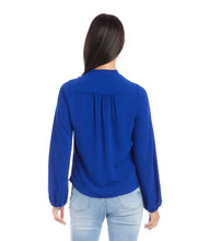 Load image into Gallery viewer, This stunning top in a striking blue color, exudes modern elegance with its luxurious moss crepe fabric that drapes gracefully and flatters the figure. With a sophisticated cowl neck, this top is suitable for both formal and casual occasions. Color- Royal blue. Cowl neck. Blouson sleeves. Elasticized cuffs. Fabric - Moss Crepe: 100% Polyester.
