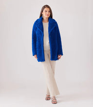 Load image into Gallery viewer, Experience ultimate warmth and comfort with the Rylan Royal Blue Sherpa Coat by Karen Kane. Featuring a cloverleaf lapel collar and front snaps, this coat is the perfect combination of style and cozy warmth to keep you snug during the coldest temperatures.  Color- Royal blue. Length: 31 7/8 inches (size M) Peaked lapel collar. Long sleeves. Lined.
