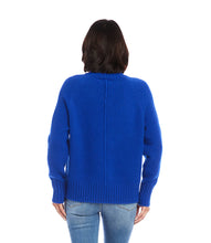 Load image into Gallery viewer, This turtleneck is versatile and perfect for colder days and nights. It can be worn under coats or on its own, making it a great choice for any occasion. Made from recycled materials, it reflects our commitment to reducing environmental impact while keeping you on-trend.  Color- Royal blue. Length: 23 1/2 inches (size M). Ribbed hem. Long sleeves. Ribbed cuffs.
