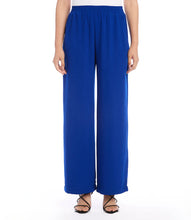 Load image into Gallery viewer, These wide leg pants effortlessly blend style with comfort, thanks to the elasticized waistband providing a flattering and comfortable fit. It&#39;s the ideal fusion of fashion and functionality.  Color - Royal blue. Full length. Wide-leg. Elasticized waistband. Inseam: 30 inches (size M). Front rise: 13 1/8 inches (size M). Leg Opening: 25 inches (size M). Fabric -Moss Crepe: 100% Polyester.
