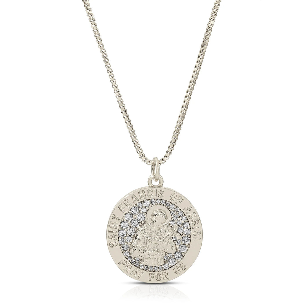 Saint Francis of Assisi is the patron Saint of animals, the environment, merchants and healing.  This gorgeous Saint Francis of Assisi pendant in silver sparkles with tiny clear cubic zirconia inlay and hangs from a dainty 1 mm box chain. The words 