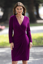 Load image into Gallery viewer, This captivating wrap dress truly elevates any look with its sophisticated yet comfortable wrap front. The shimmering rhinestone brooch adds a luxurious edge to the figure-hugging design, making for a stunningly alluring piece. Show-stopping elegance and glamour await with this dazzling wrap dress.  Color- Sangria. Wrap front. Long sleeves. Rhinestone brooch. Fabric -95% Polyester. 5% Elastane.
