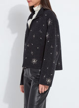 Load image into Gallery viewer, Model wearing a charcoal grey jacket with rhinestone snowflake patterns, white turtleneck and black pants against a white background.
