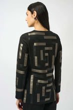 Load image into Gallery viewer, Woman wearing black/multi patterned long jacket and black pants against a white background.
