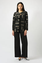 Load image into Gallery viewer, Woman wearing black/multi patterned long jacket, black pants and silver heels against a white background.
