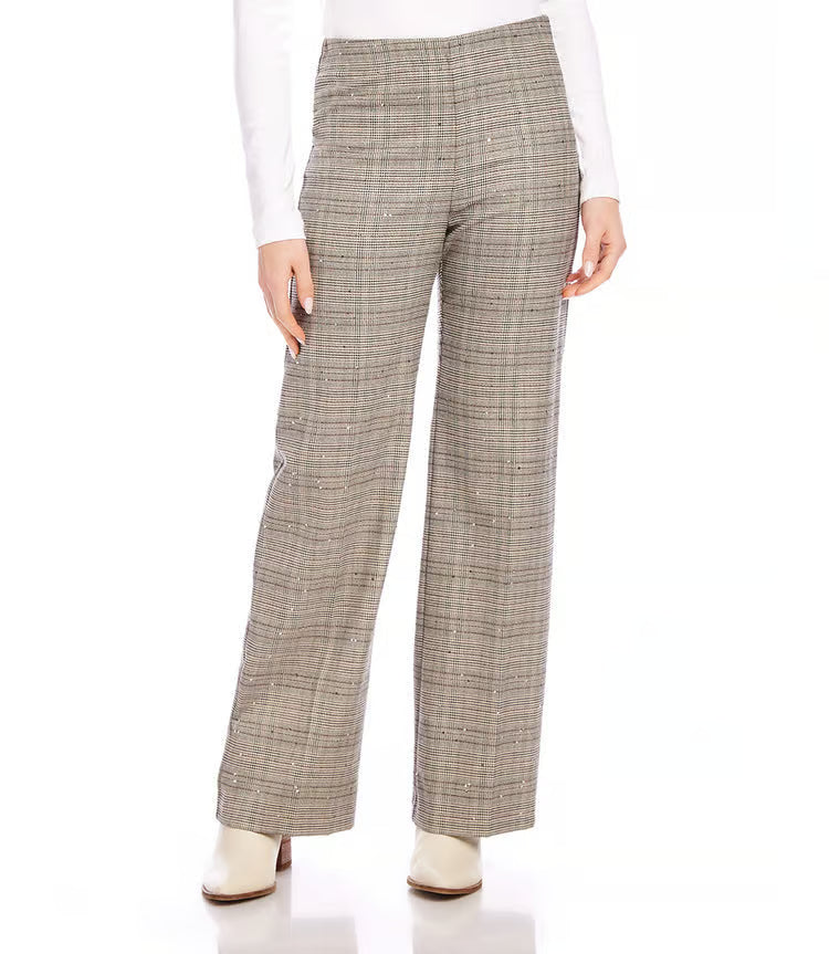 The Shelby Sequin Plaid Pants by Karen Kane are crafted from woven material and adorned with stunning embroidered sequins that glimmer in the light. Ideal for both work and a night out, these pants exude sophistication and a touch of dazzle to elevate any ensemble.