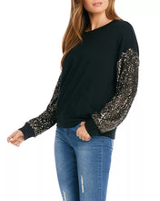 Load image into Gallery viewer, Constructed from a luxuriously soft fabric blend, this top, in a sweatshirt fabrication, is ideal for any type of event, from casual to formal. It pairs beautifully with both denim and skirts and boasts a crew neckline and long sleeves adorned with sequins for a subtle touch of shimmer.
