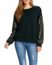 Load image into Gallery viewer, Constructed from a luxuriously soft fabric blend, this top, in a sweatshirt fabrication, is ideal for any type of event, from casual to formal. It pairs beautifully with both denim and skirts and boasts a crew neckline and long sleeves adorned with sequins for a subtle touch of shimmer.
