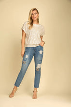 Load image into Gallery viewer, A versatile wardrobe essential, the Frank Lyman Denim 234146U boasts a sophisticated design with sequin patches, stars and cheetah patches. This classic denim silhouette is a must-have for any fashionista, providing the perfect blend of style and comfort for any occasion. Offering a fun, flirty look, the Frank Lyman Denim is sure to be a staple in any closet.  Color- Blue and silver. Five pockets. Zip and button closure. Front Patch Details. Silver sequins. Cheetah patches.
