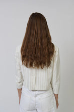 Load image into Gallery viewer, Woman wearing a white pinstripe jacket and white pants against a plain background
