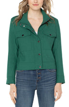 Load image into Gallery viewer, Liverpool Los Angeles&#39; Utility Crop Jacket offers minimalism with on-trend appeal. Crafted from a soft and stretchy twill fabric, this piece provides an optimal blend of feminine charm and edgy appeal for versatile styling.  Color - Serpentine; Bright green. Collared. Double front patch pockets. Button and zip front closure. Snap closure at wrists. Cropped style. Fabric - 47% Polyester. 44%Viscose. 6%Elastane. 3% Other Fiber.
