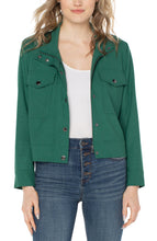 Load image into Gallery viewer, Liverpool Los Angeles&#39; Utility Crop Jacket offers minimalism with on-trend appeal. Crafted from a soft and stretchy twill fabric, this piece provides an optimal blend of feminine charm and edgy appeal for versatile styling.  Color - Serpentine; Bright green. Collared. Double front patch pockets. Button and zip front closure. Snap closure at wrists. Cropped style. Fabric - 47% Polyester. 44%Viscose. 6%Elastane. 3% Other Fiber.
