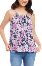 Load image into Gallery viewer, The Karen Kane Shay Shirred Floral Tank is a vibrant, sleeveless top featuring soft shirring and sleek cutaway shoulders for a flattering fit. Designed with a bold floral print in berry, purple, navy, and multicolor hues, this tank adds a fresh, feminine touch to any outfit. Crafted from lightweight, breathable fabric, it’s perfect for layering or wearing solo in warm weather.
