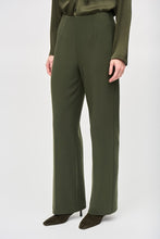 Load image into Gallery viewer, Fabulous and sleek, this high-rise wide leg pant in a gorgeous green will instantly elevate your outfit. The Hensley boasts a flattering high-rise waistline, is fitted through the thigh and flares out to create that ultra-flattering wide leg effect.
