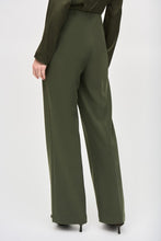 Load image into Gallery viewer, Fabulous and sleek, this high-rise wide leg pant in a gorgeous green will instantly elevate your outfit. The Hensley boasts a flattering high-rise waistline, is fitted through the thigh and flares out to create that ultra-flattering wide leg effect.
