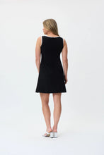 Load image into Gallery viewer, Make a statement with the Joseph Ribkoff Black and Vanilla Dress, designed for effortless elegance. This sleeveless, knee-length dress features a modern color-blocked design, perfect for both formal events and casual outings. Crafted from soft ITY fabric, it offers a comfortable stretch fit that moves with you. Designed for versatility, the Black/Vanilla color combination creates a striking contrast, making it perfect for both daytime chic and evening elegance. 

