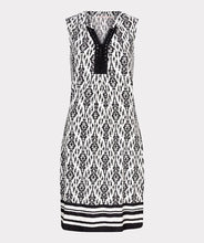 Load image into Gallery viewer, This bestselling EsQualo dress features a chic two-tone Ikat print in classic black and white, making it perfect for a variety of occasions. The beads on the neckline provide a polished finishing touch.
