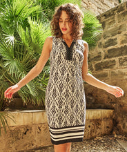 Load image into Gallery viewer, This bestselling EsQualo dress features a chic two-tone Ikat print in classic black and white, making it perfect for a variety of occasions. The beads on the neckline provide a polished finishing touch.
