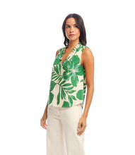 Load image into Gallery viewer, Woman wearing a sleeveless top with green and cream floral and leaf pattern on a white background.
