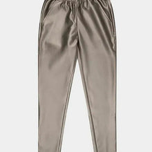 Load image into Gallery viewer, Our &quot;Trousers Tregging PU&quot; provides a combination of two different styles. Crafted from top-notch faux leather, these treggings offer a comfortable fit with a fashionable look. With its legging-style and a trouser design, this tregging has an unique presentation. Adding a subtle splash of gold helps to give it a modern, chic appearance.  Color - Soft gold. Pull on. Faux leather. Elastic waistband. Functional front and back pockets.
