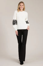 Load image into Gallery viewer, Elevate your favorite cozy sweater with stylish soutache appliqués, transforming a wardrobe staple into something special. This versatile piece pairs perfectly with everything from ballet flats to boots and jeans. Ideal for any occasion, this sweater is a must-have addition to your collection.
