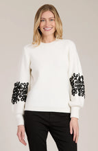 Load image into Gallery viewer, Elevate your favorite cozy sweater with stylish soutache appliqués, transforming a wardrobe staple into something special. This versatile piece pairs perfectly with everything from ballet flats to boots and jeans. Ideal for any occasion, this sweater is a must-have addition to your collection.
