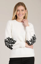 Load image into Gallery viewer, Elevate your favorite cozy sweater with stylish soutache appliqués, transforming a wardrobe staple into something special. This versatile piece pairs perfectly with everything from ballet flats to boots and jeans. Ideal for any occasion, this sweater is a must-have addition to your collection.
