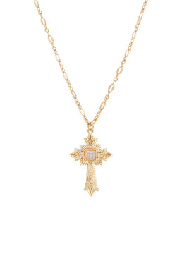 A sparkling gold cross pendant is enhanced with a moonstone gem set in the middle of the cross.  This perfect necklace needs a place in your jewelry box.  Color- Gold and moonstone. Moonstone gem. 22-inch length with a 2-inch extender. Pendant measures approximately 1 inch. 14 kt gold plate over brass.