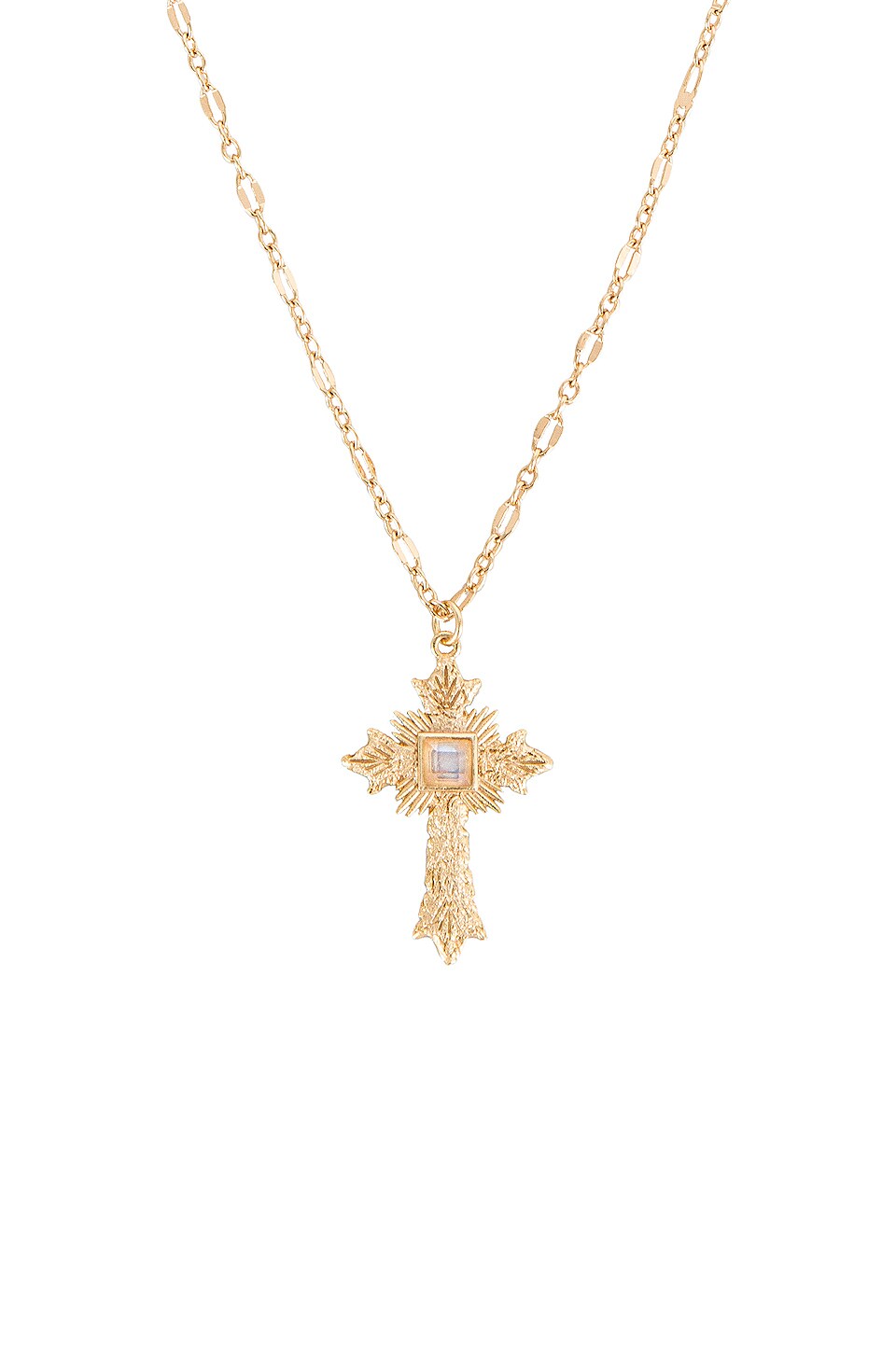 A sparkling gold cross pendant is enhanced with a moonstone gem set in the middle of the cross.  This perfect necklace needs a place in your jewelry box.  Color- Gold and moonstone. Moonstone gem. 22-inch length with a 2-inch extender. Pendant measures approximately 1 inch. 14 kt gold plate over brass.