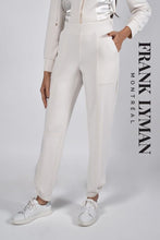 Load image into Gallery viewer, This pant boasts a casual yet elegant design, featuring a relaxed fit pull-on pant in a neutral stone color. The design also includes a high waist and convenient slash pockets. Easy to wear, this style offers both comfort and sophistication.  Color- Stone. 28-inch seam. Slash pockets. Relaxed fit. Pull-on pant.

