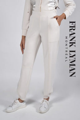 This pant boasts a casual yet elegant design, featuring a relaxed fit pull-on pant in a neutral stone color. The design also includes a high waist and convenient slash pockets. Easy to wear, this style offers both comfort and sophistication.  Color- Stone. 28-inch seam. Slash pockets. Relaxed fit. Pull-on pant.