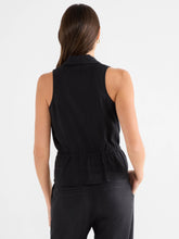 Load image into Gallery viewer, Woman wearing a black sleeveless top and black pants against a white background.
