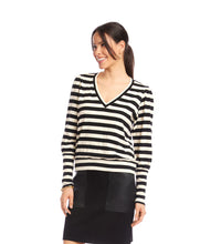 Load image into Gallery viewer, Woman wearing a black and cream striped top with a black leather skirt  against a white background.
