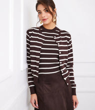 Load image into Gallery viewer, Woman wearing a brown and white striped cardigan and brown skirt against a white background.
