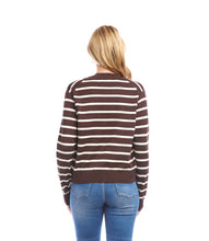 Load image into Gallery viewer, Woman wearing a brown and white striped cardigan and jeans against a white background.
