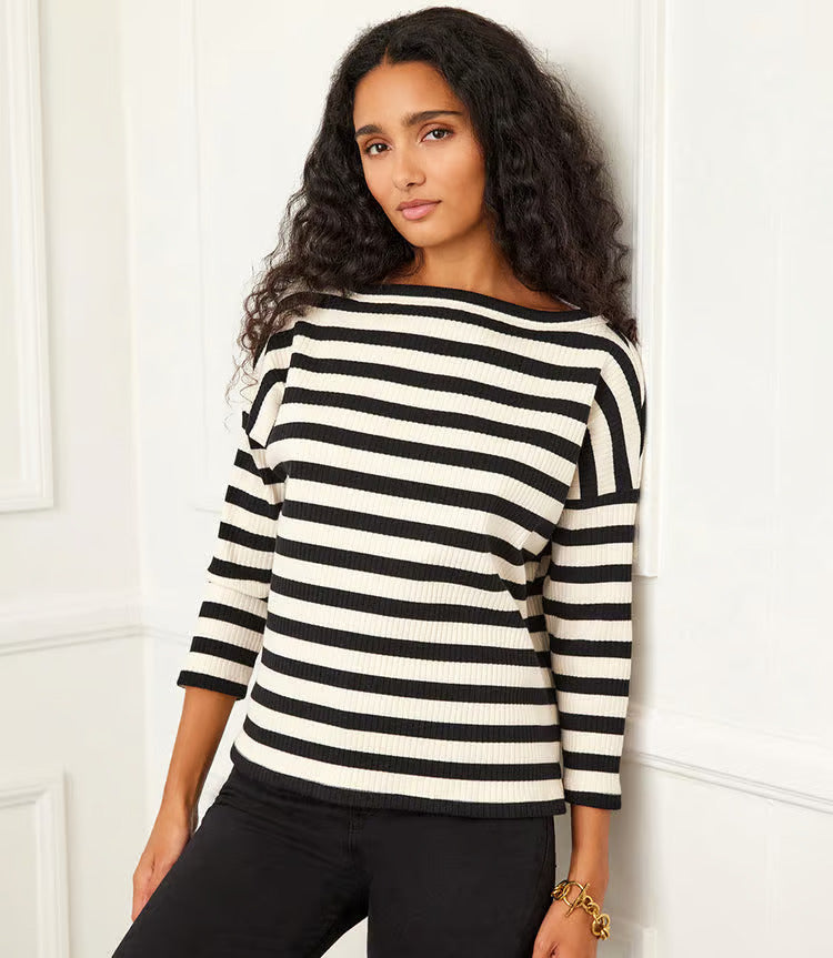 Seamlessly switch between seasons and outfits with this versatile ribbed boatneck top. It's comfortable and stretchy, perfect for pairing with your go-to jeans for a casual weekend vibe or with sleek trousers for a sophisticated work look.