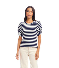 Load image into Gallery viewer, Woman wearing a blue and white top against a white background.
