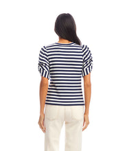 Load image into Gallery viewer, Woman wearing a blue and white top against a white background.
