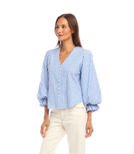 Load image into Gallery viewer, Woman wearing a blue and white striped blouse against a white background.
