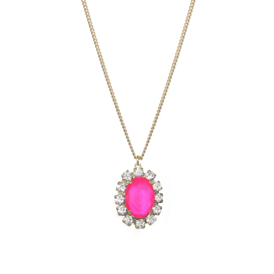 Glamorize your ensemble with the Suki Necklace! Made with premium crystals and antique gold plating on a brass base metal, it will be the highlight of any ensemble. A perfect jewelry piece to wear alone or layer with your other favorite pieces.  Color- Pink, clear and gold. Pink crystal. Clear crystals. Antique gold plating over brass metal. Length -16