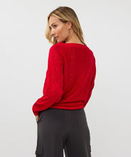 Load image into Gallery viewer, This elegant EsQualo Sweater in a stunning shade of red features a classic boat neck, a unique bat sleeve, and a beautiful open-knit design, all adorned with delicate lurex details for a subtle yet glamorous touch of sparkle. Elevate any outfit with this chic and versatile piece.
