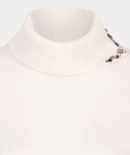 Load image into Gallery viewer, Elevate your wardrobe with the EsQualo Embellished Gem Collar Sweater. This stunning piece features a split turtleneck adorned with gem embellishments on both sides of the split collar, adding a touch of elegance and sophistication to your look. The sweater is designed with long sleeves, two floral gems on each cuff and a comfortable fit, making it perfect for both casual and dressy occasions.
