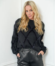 Load image into Gallery viewer, Wrap yourself in warmth and style, with our Henrika Hair Sequins Sweater in an eye-catching fuzzy checkered design. A fashion-must have, our EsQualo sweater is made of fluffy warm hairy fabrication set off with tiny, sparkle sequins. The Henrika is perfect for everything from daily routines to holiday attire, offering a luxurious feel in its cozy, warm embrace.
