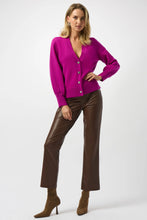 Load image into Gallery viewer, Woman wearing a purple cardigan with rhinestone buttons, brown faux leather pants and brown boots against a white background.
