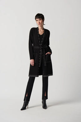 Relish the comfort of this chic cover-up, made from a plush sweater knit. Its feminine V-neckline and long sleeves make it a versatile piece for transitioning through the seasons. The silver studded embellishment detailing makes this style a stand-out piece. Pair it with your beloved pants, leggings, or skirts for a timeless ensemble you'll love revisiting.