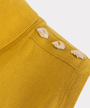 Load image into Gallery viewer, Close-up of golden olive sweater top with gold buttons against a light gray background.
