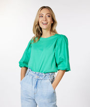 Load image into Gallery viewer, Our Posy t-shirt is not your ordinary, everyday t-shirt! Add puff sleeves and a gorgeous shade of green in jade color and you have yourself a beautiful basic with a darling design. The Posy really pops when paired with white bottoms or shorts.  Color - Jade green. Pullover. Puff sleeves. Bodice is t-shirt stretch material.  Sleeves are more of a crisp cotton fabrication.
