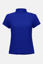 Load image into Gallery viewer, Blue textured mock neck top against a white background.
